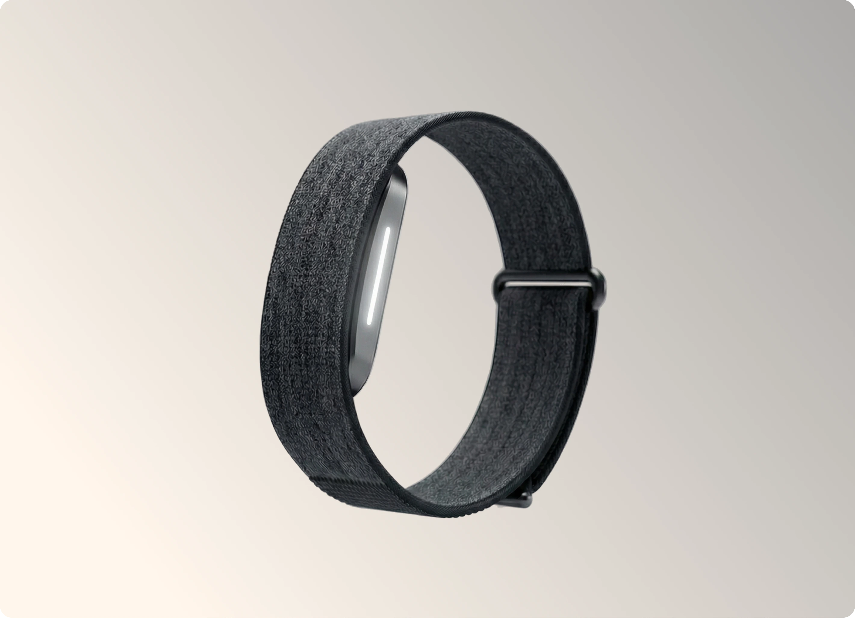 The Hume Band 2.0 longevity band with a woven strap, resting calmly in warm morning light
